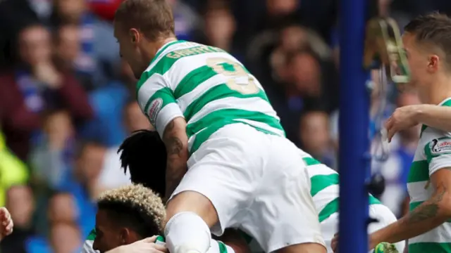 Celtic celebrate breaking the deadlock at Ibrox