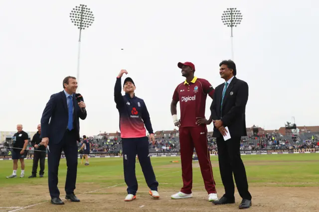 Eoin Morgan and Jason Holder