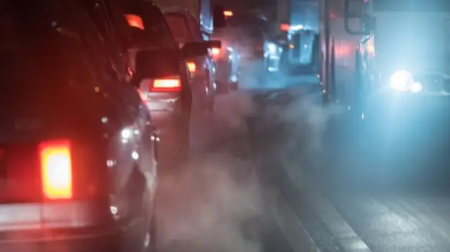 Cars and exhaust fumes