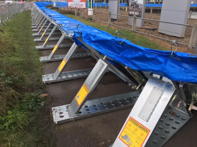 Temporary flood barrier