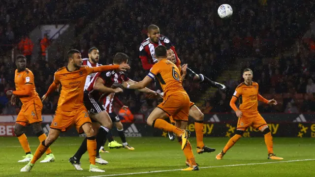 Leon Clarke scores