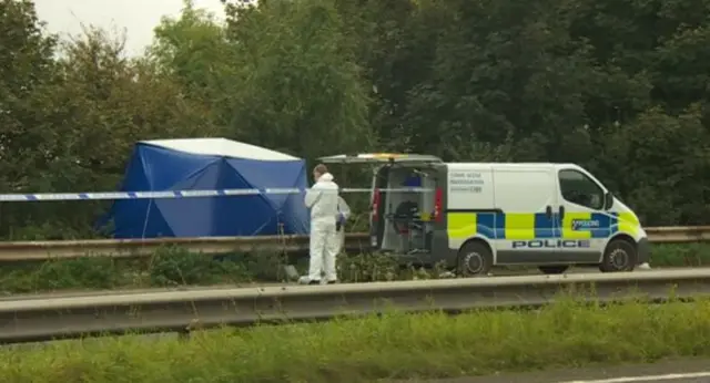 Crime scene investigators at A15