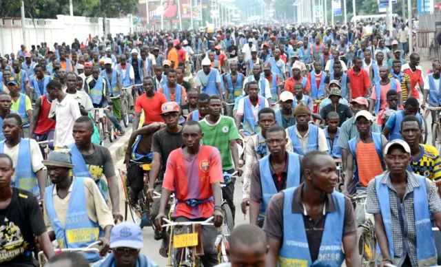 Demonstrators march as they protest against the report by the United Nation's Human Rights Commission on Burundi, on February 11, 2017 in the capital Bujumbura.