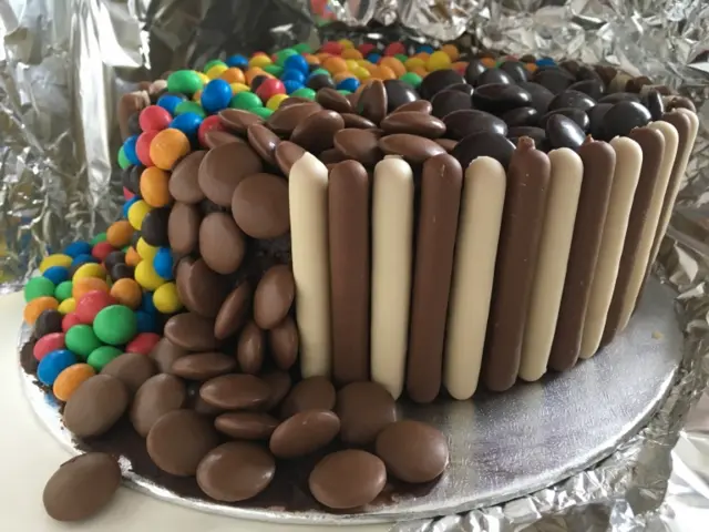 A chocolate and coloured sweets cake