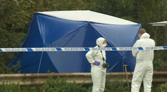 Forensic scientists at the scene