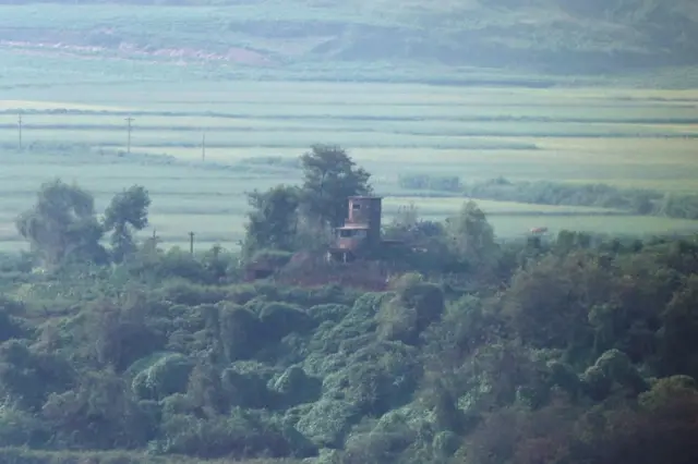 A North Korean guard post seen from a South Korean observation post in Paju