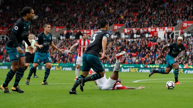 Virgil van Dijk brings down Saido Berahino