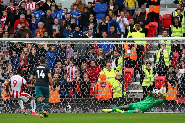 Saido Berahino's penalty is saved by Fraser Forster