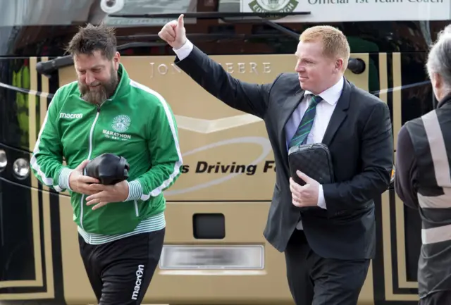 Neil Lennon salutes the fans on his arrival at Celtic Park