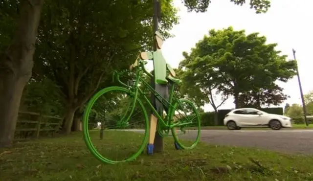 A bike against a tree