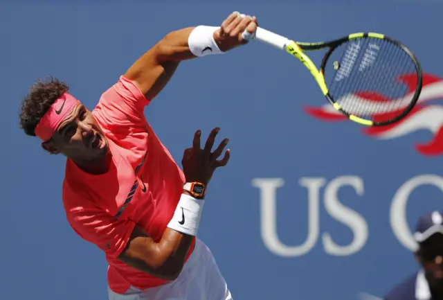 Rafael Nadal of Spain serves