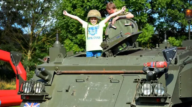 Noah Tucker, aged 10 from Stafford inside one of the tanks on show