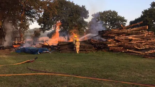 Fire crews tackling the logs blaze