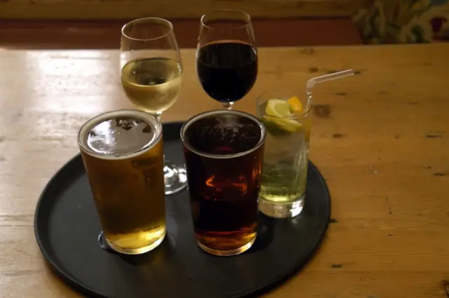 A selection of alcoholic drinks on a tray