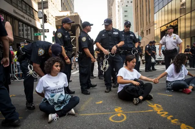 Immigration activists protesting against the Trump administration's Daca decision are arrested outside Trump Tower in New York.