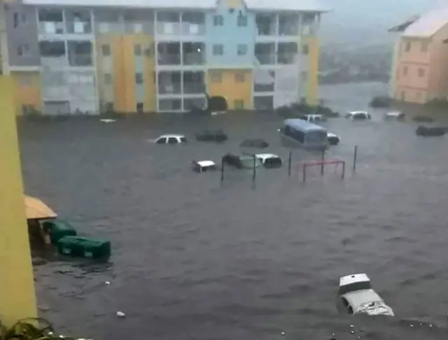 Submerged cars on the French overseas island of Saint-Martin