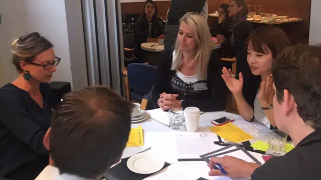 The participants of The Fix sitting at Table Three