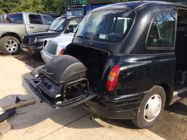 Black Cab with barbecue on the boot