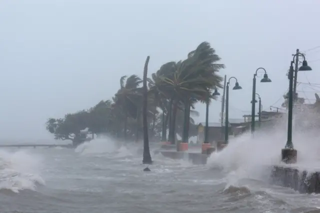 Waves crash against the seawall as Hurricane Irma slammed across islands in the northern Caribbean on Wednesday, in Fajardo, Puerto Rico