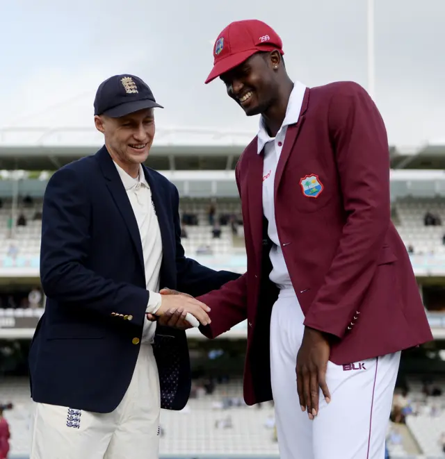 Joe Root and Jason Holder