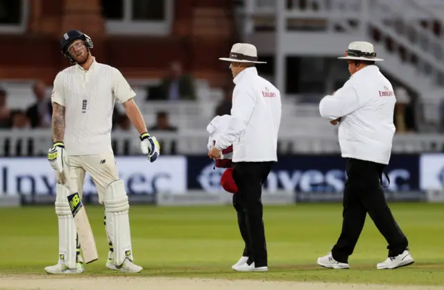 Ben Stokes and Umpires Chris Gaffaney and Marais Erasmus