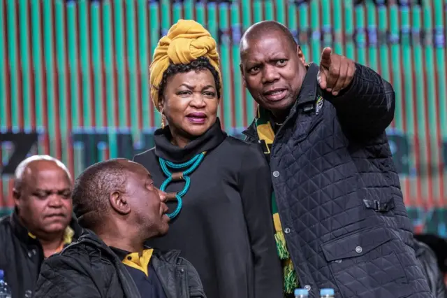 South African Parliament speaker Baleka Mbete (L) talks with African National Congress Treasury General Zweli Mkhize (R) at the opening session of the South African ruling party African National Congress policy conference on June 30, 2017 in Johannesburg, South Africa.