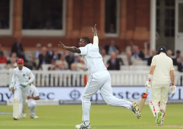 Jason Holder celebrates