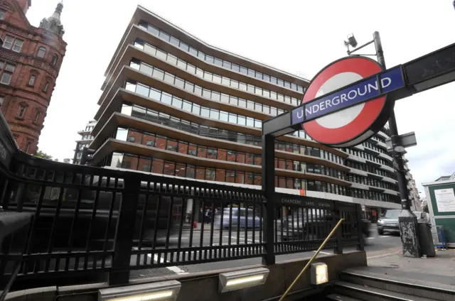 Bell Pottinger's London office is seen behind a London underground sign