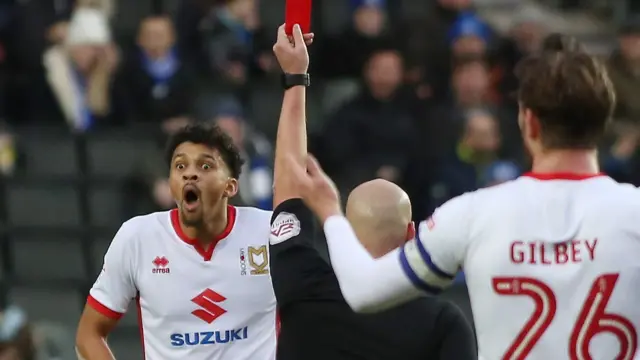 MK Dons player Osman Sow is sent off
