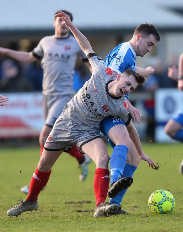 Crusaders winger Gavin Whyte doesn't look too impressed with this challenge at Ferney Park