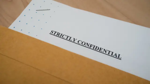 A document that reads: Strictly confidential