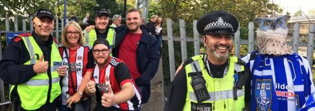 South Yorkshire Police officers with football fans from Sheffield