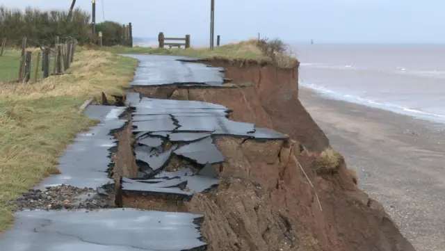 Crumbled road on cliff edge