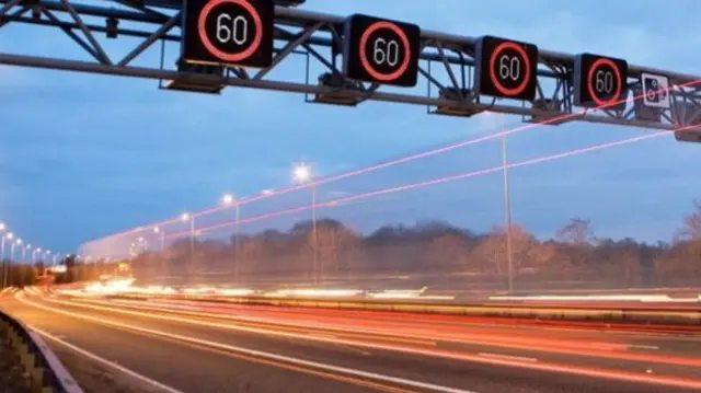 Speed limit signs on a motorway