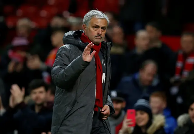 Jose Mourinho salutes the crowd