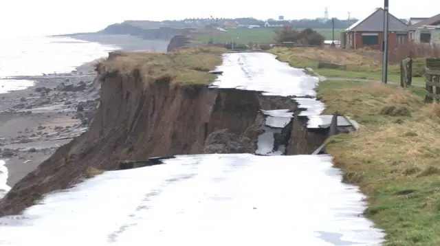 Crumbled road on cliff edge