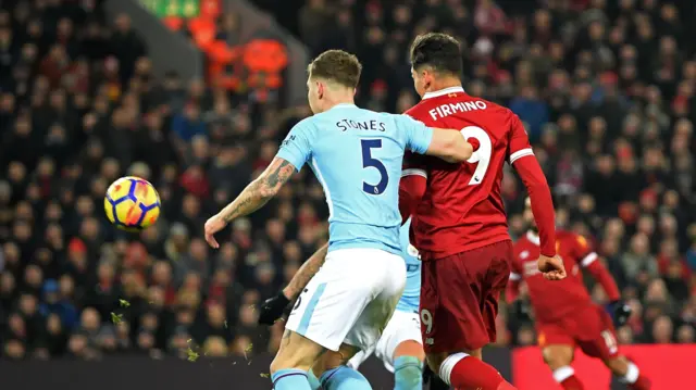 John Stones and Roberto Firmino