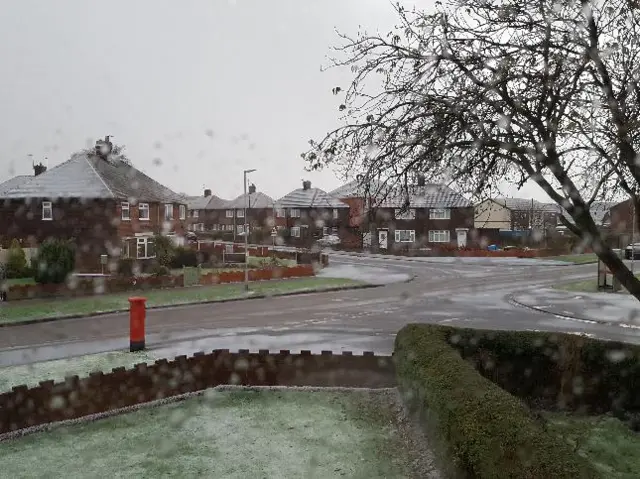 A light covering of snow on a street in Goole