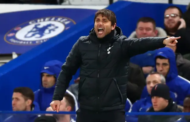 Chelsea manager Antonio Conte signals to his players