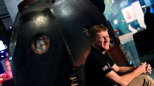 Tim Peake with capsule