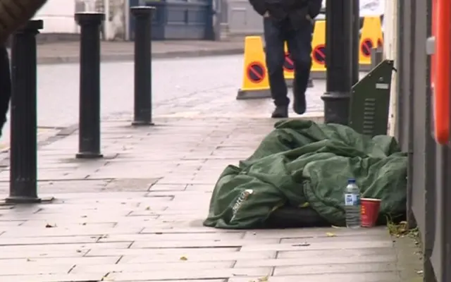 A person sleeping rough