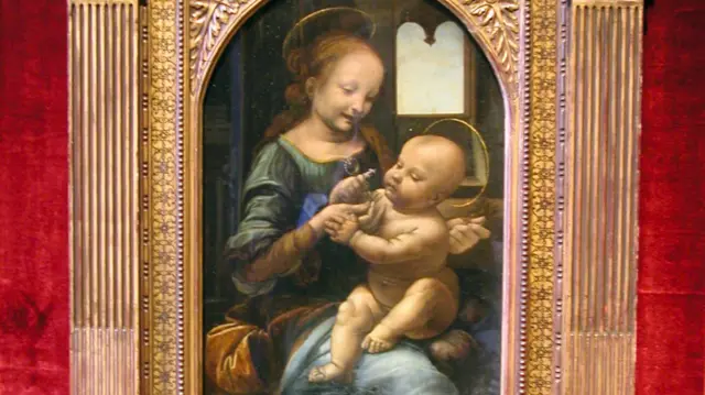 Madonna and Child with Flowers, otherwise known as the Benois Madonna (1478) by Leonardo da Vinci, on the wall in the State Hermitage Museum, St Petersburg.