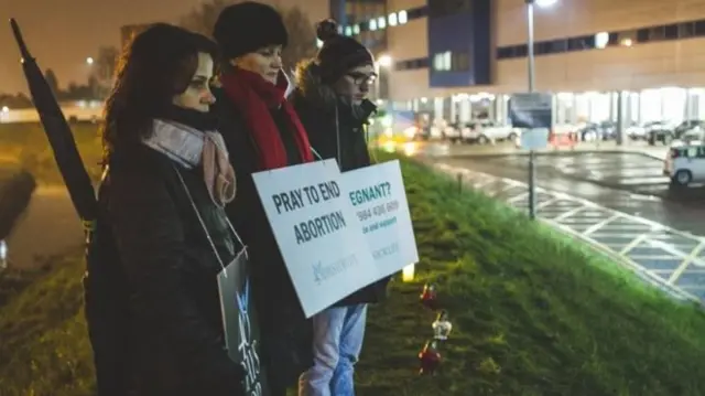 A similar protest was held outside QMC last year