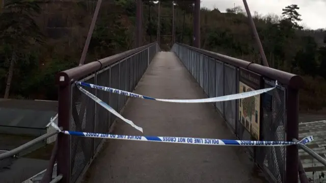 Police tape on footbridge on 6 January