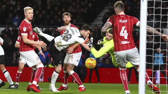 Aden Flint clears off the line