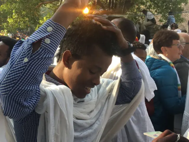 Timkat festival - a young boy smiles