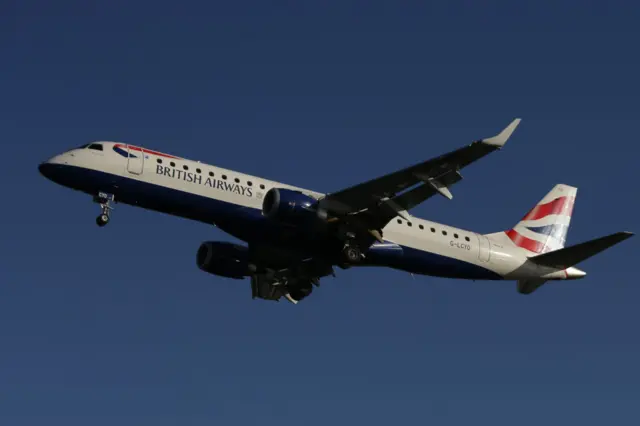 A British Airways airplane is seen as it flies in to land at London City Airport in London on October 27, 2017.