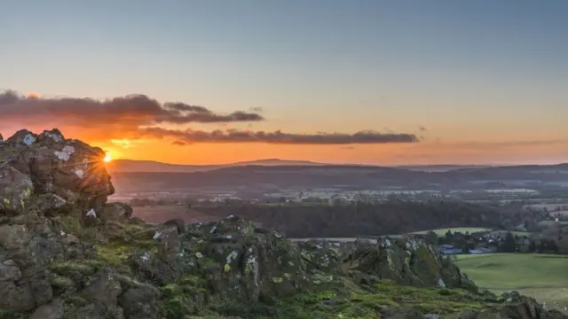 Dawn on the Gaer Stone, Shropshire this morning