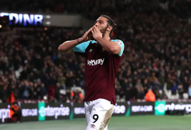 Andy Carroll celebrates scoring against West Brom