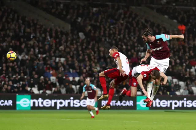 Andy Carroll scores against West Brom